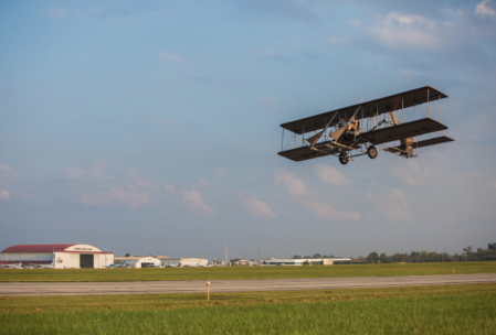The Wright "B" Flyer replica takes off from Dayton-Wright Brothers Airport 