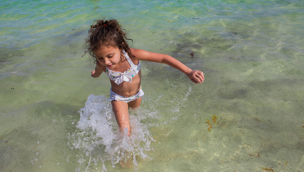 The shallow water off Puerto Morelos' beach is perfect for the little ones.